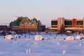 Igloos on the Louise BasinÃ¢â¬â¢s frozen surface seen during a sunny early winter morning